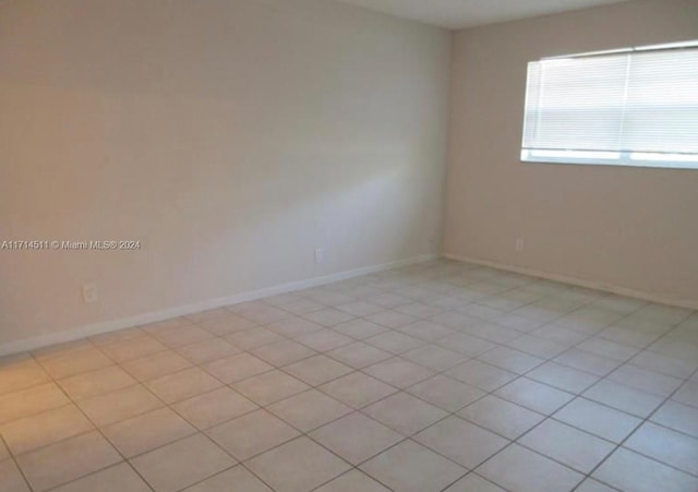 view of tiled spare room