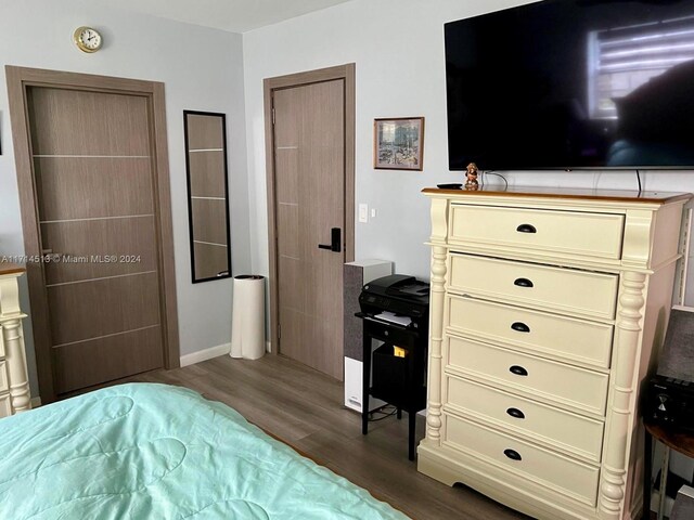 50 NW 209th St, Miami Gardens, FL 33169 - bedroom featuring dark wood-type flooring