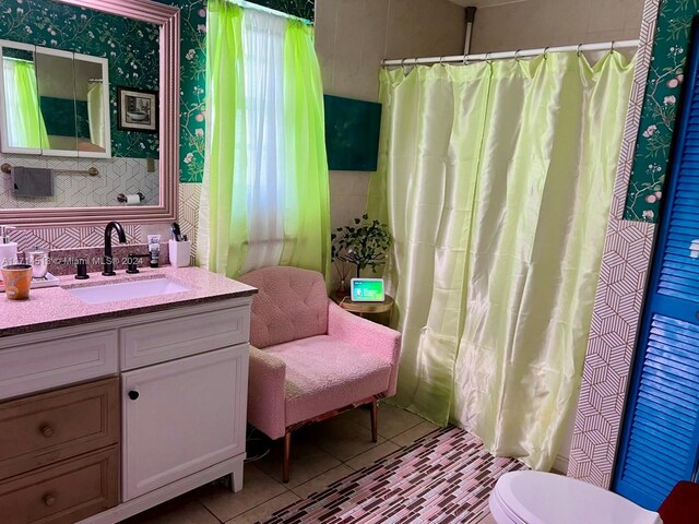 50 NW 209th St, Miami Gardens, FL 33169 - bathroom featuring tasteful backsplash, tile patterned floors, toilet, vanity, and a shower with shower curtain