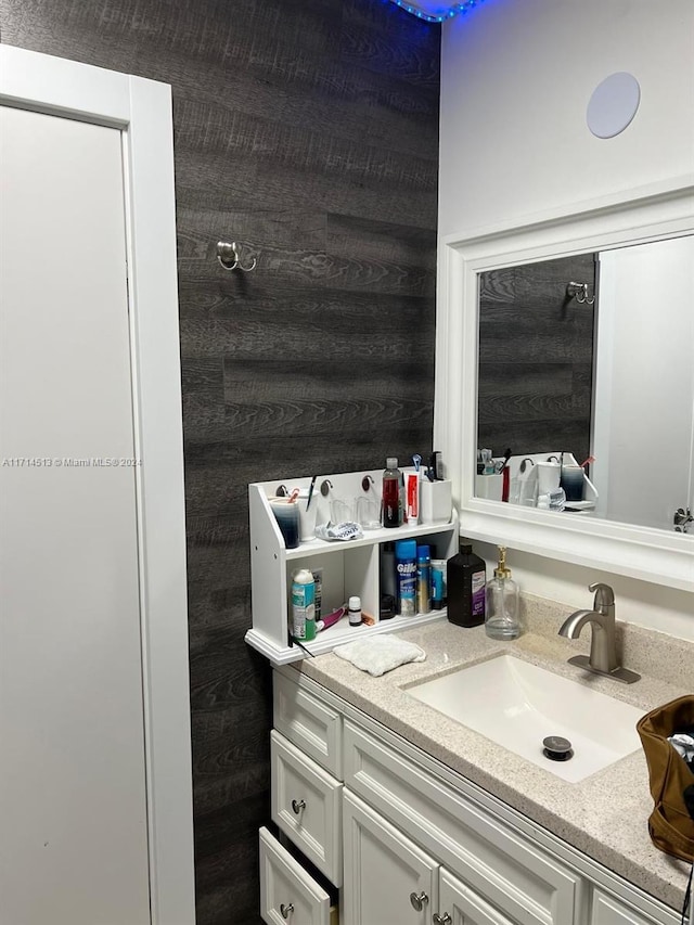 50 NW 209th St, Miami Gardens, FL 33169 - bathroom with wooden walls and vanity