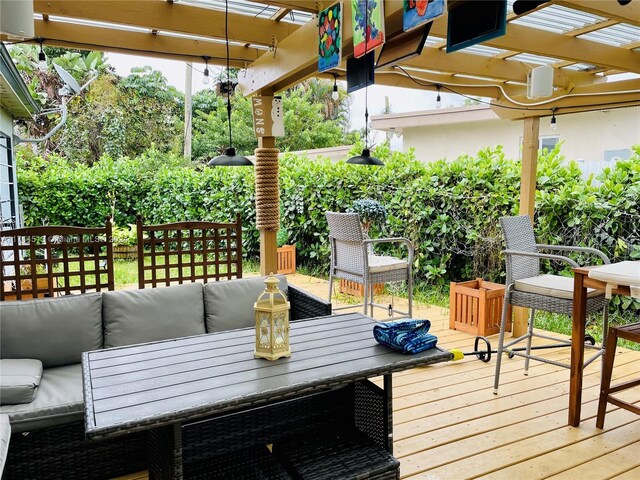 50 NW 209th St, Miami Gardens, FL 33169 - wooden deck featuring an outdoor hangout area