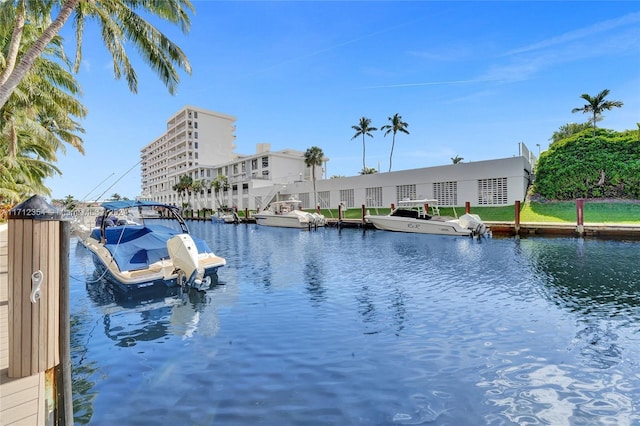 property view of water with a dock