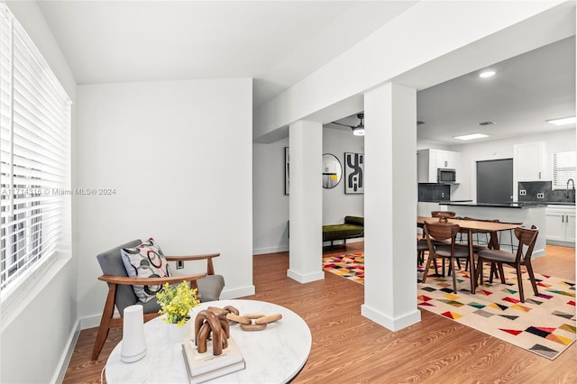 sitting room with light hardwood / wood-style flooring