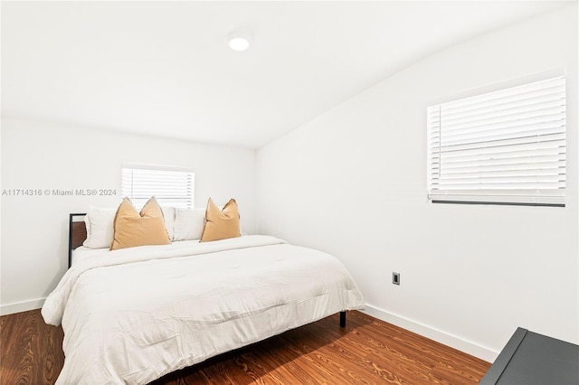 bedroom featuring dark hardwood / wood-style floors