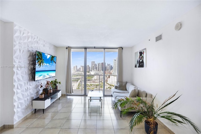 living room featuring a wall of windows