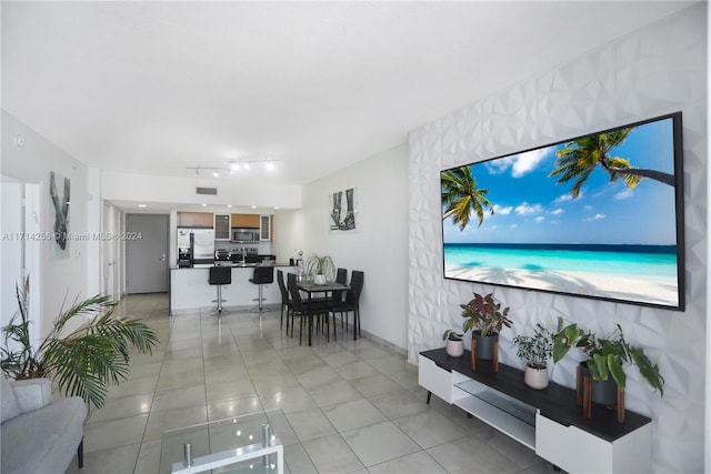 1750 N Bayshore Dr Unit 3210, Miami, FL 33132 - living area with light tile patterned floors and rail lighting