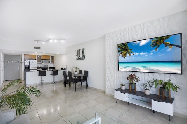 living room with light tile patterned floors