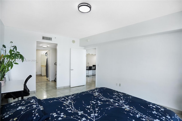 unfurnished bedroom featuring tile patterned flooring