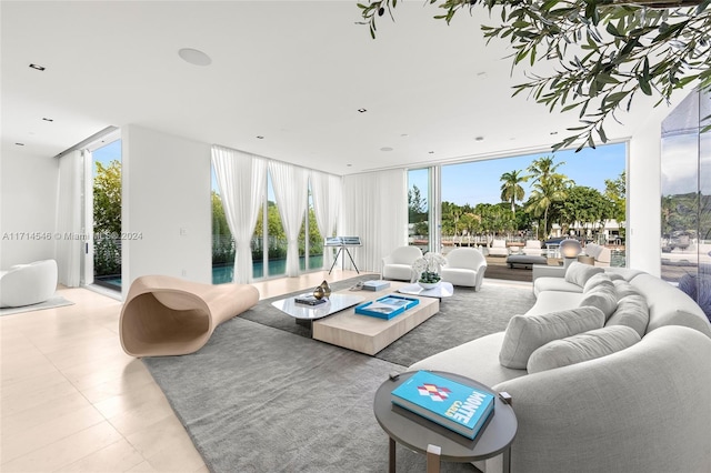 living room with floor to ceiling windows