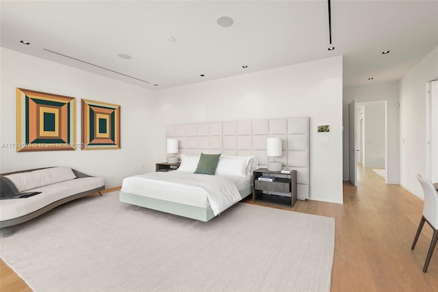 bedroom featuring light hardwood / wood-style flooring