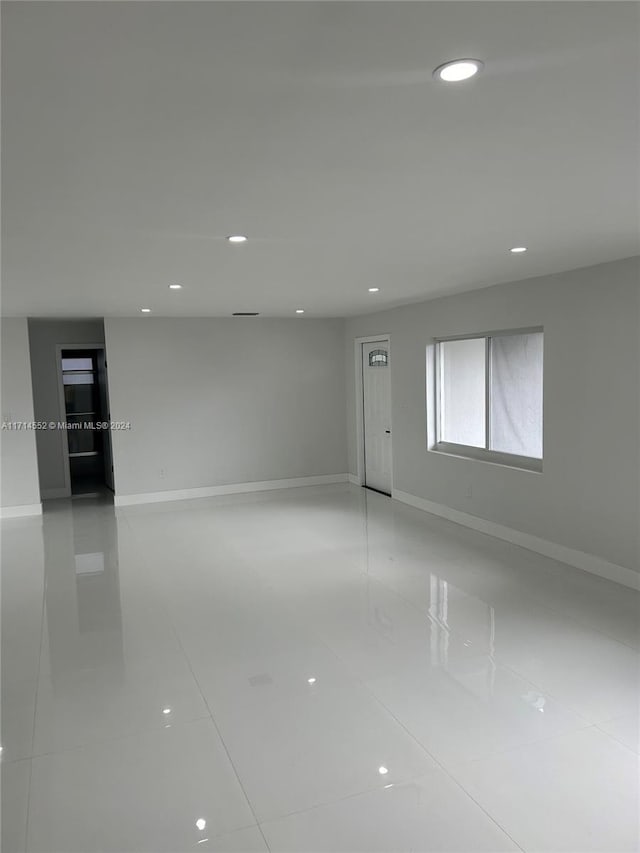 empty room featuring tile patterned flooring