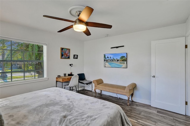 bedroom featuring ceiling fan and light wood-type flooring