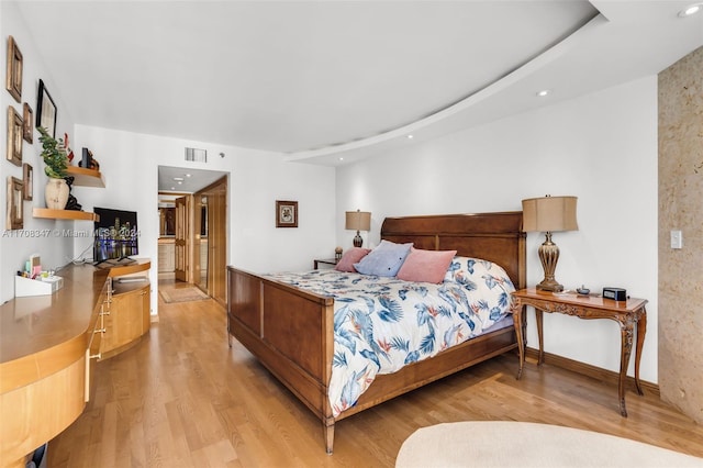 bedroom featuring light hardwood / wood-style flooring