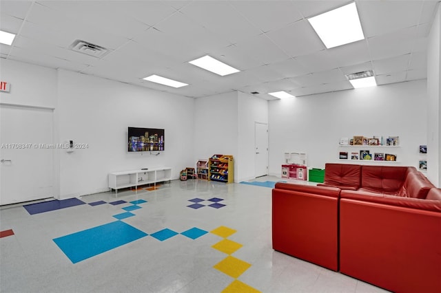 playroom featuring a drop ceiling