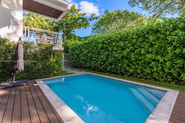 view of pool featuring a deck