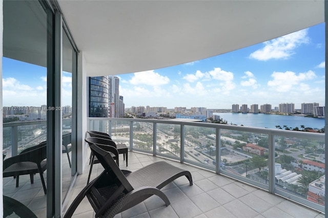 balcony featuring a water view