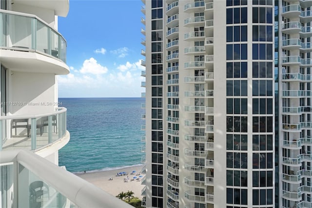 property view of water featuring a beach view