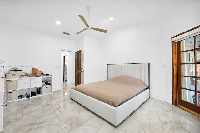 bedroom featuring ceiling fan and vaulted ceiling