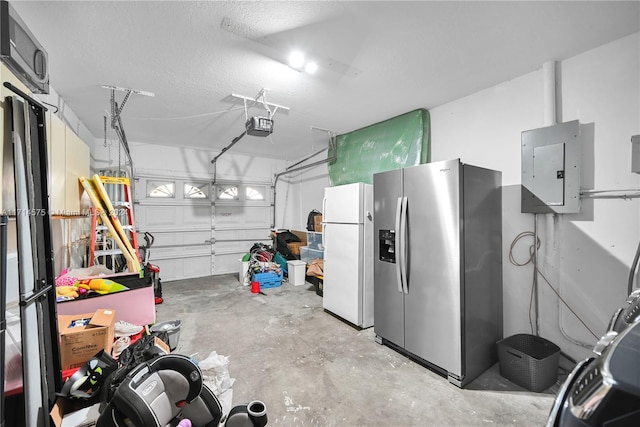 garage with white fridge, a garage door opener, stainless steel refrigerator with ice dispenser, and electric panel