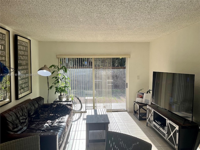 tiled living room with a textured ceiling