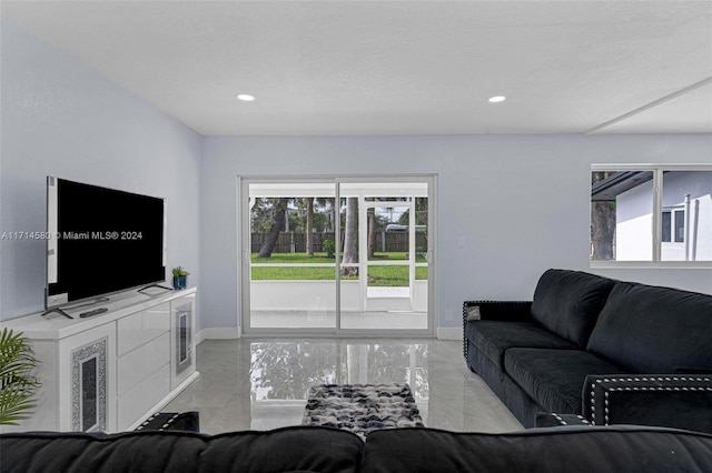 living room with light tile patterned floors