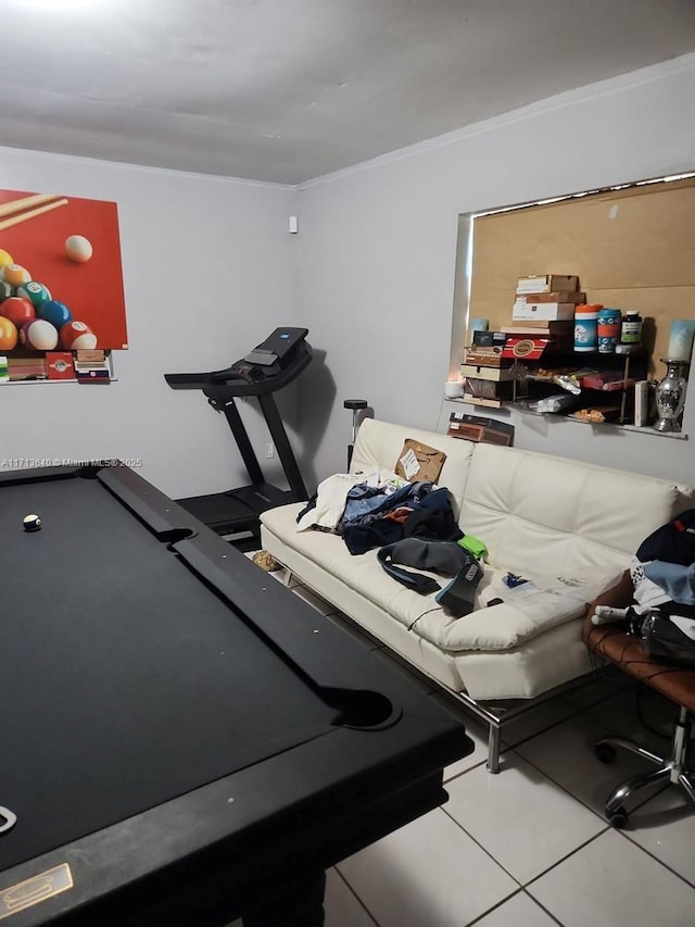 tiled bedroom with crown molding and billiards