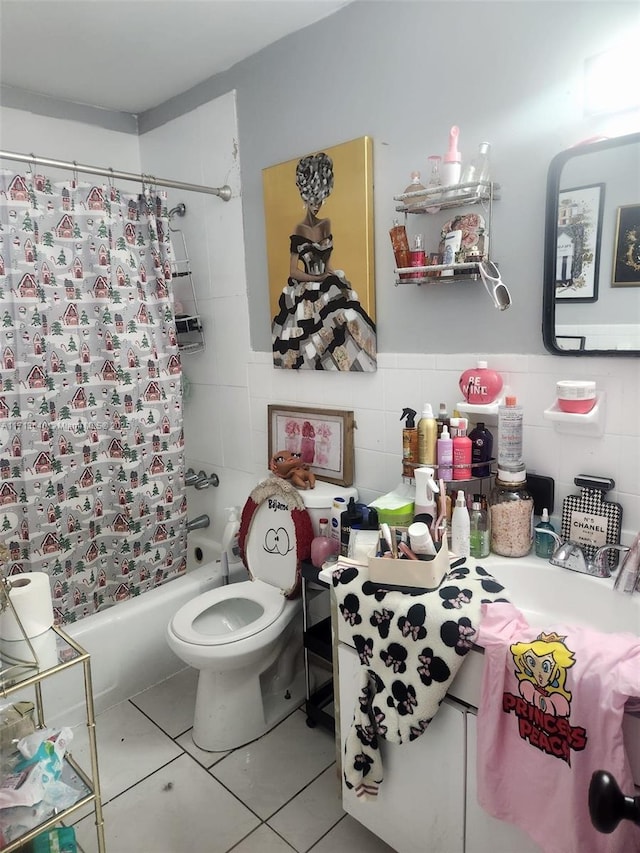 bathroom with tile patterned floors, shower / bath combination with curtain, toilet, and tile walls