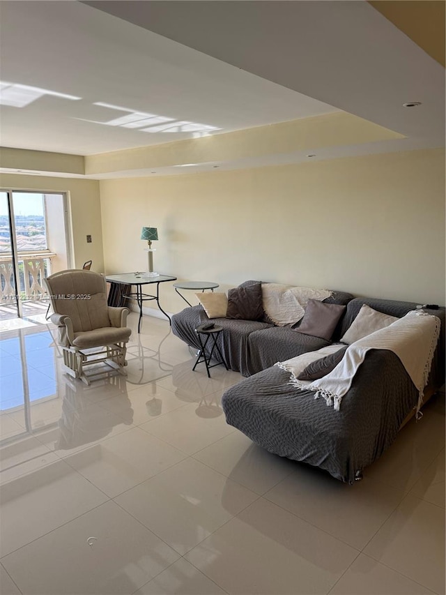 living room with light tile patterned flooring