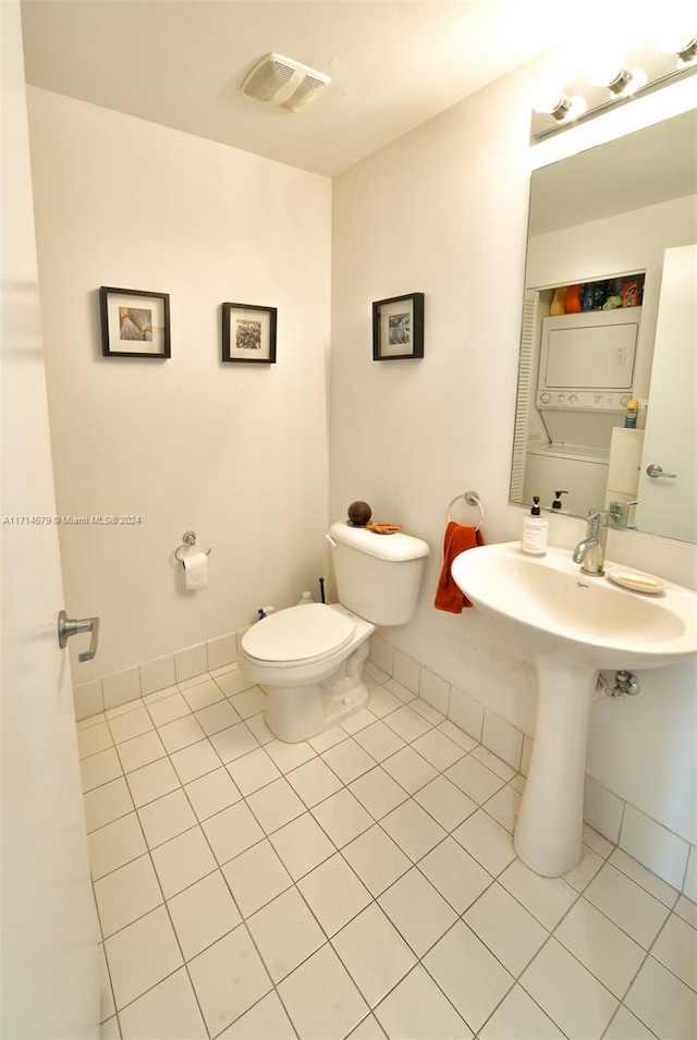 bathroom with tile patterned floors, toilet, and sink