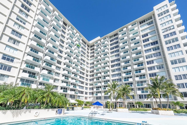 view of swimming pool with a patio area