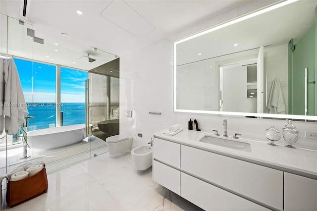 bathroom featuring an enclosed shower, vanity, a water view, a bidet, and tile walls