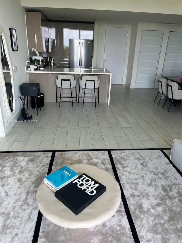 living room featuring light tile patterned flooring