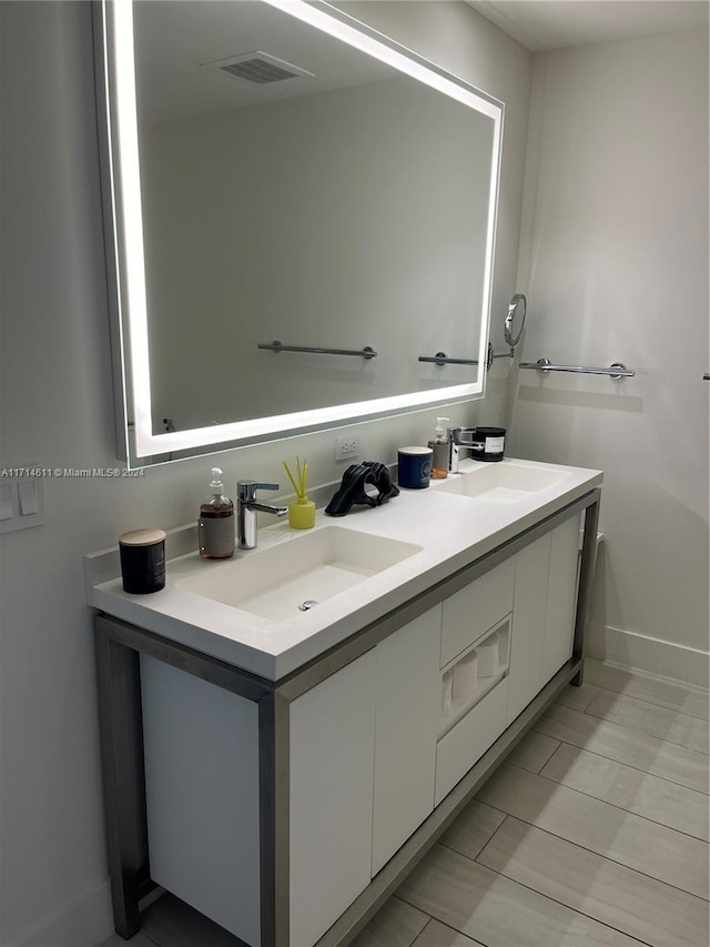 bathroom featuring tile patterned floors and vanity