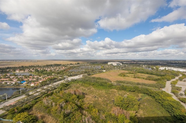 bird's eye view with a rural view and a water view