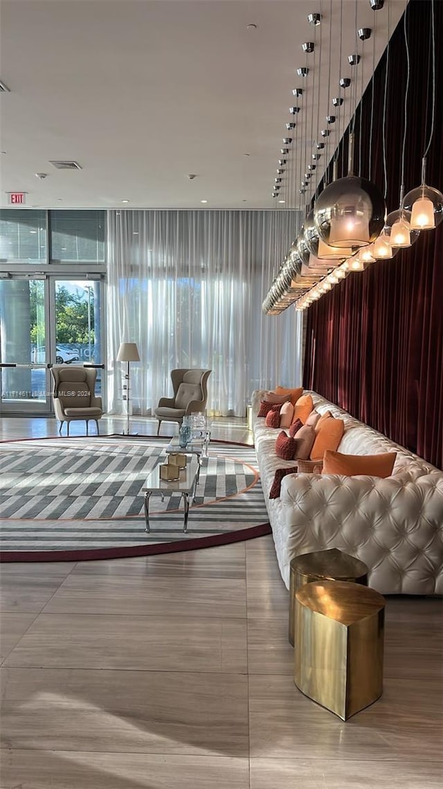 unfurnished living room featuring tile patterned flooring