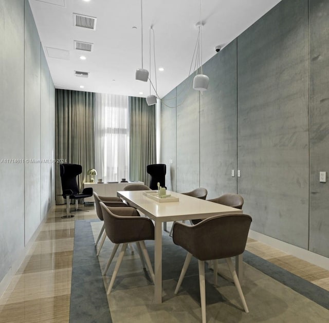 dining area featuring expansive windows