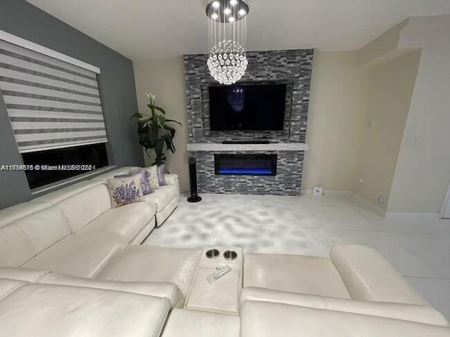 tiled living room with a fireplace and a notable chandelier