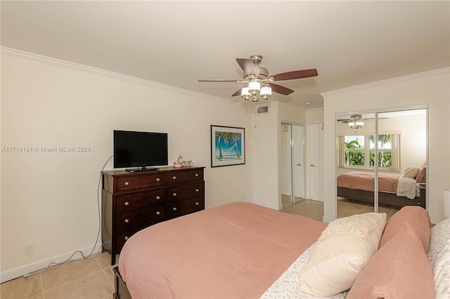 bedroom featuring light tile patterned floors, ceiling fan, and crown molding