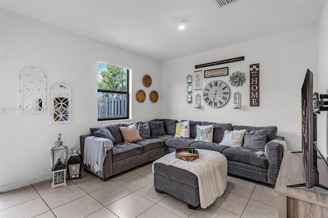 living room with light tile patterned floors