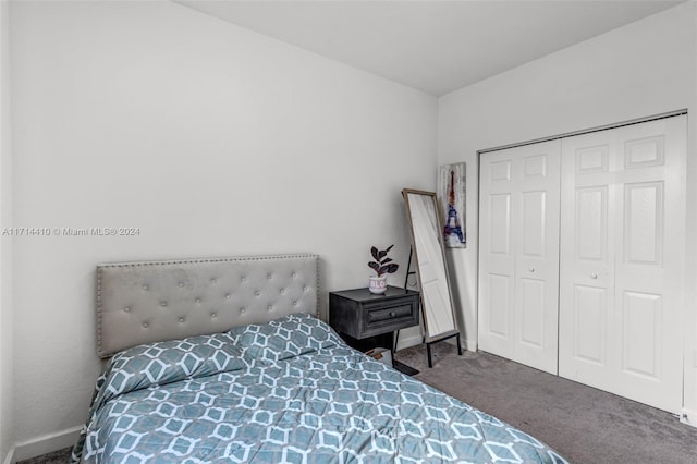 carpeted bedroom featuring a closet