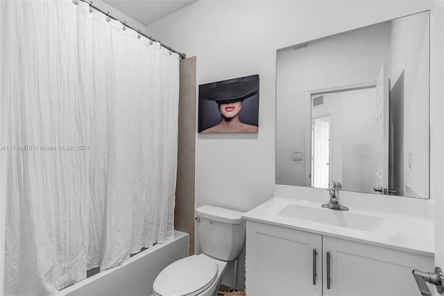 full bathroom with vanity, toilet, and shower / tub combo with curtain