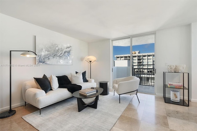 living room with floor to ceiling windows