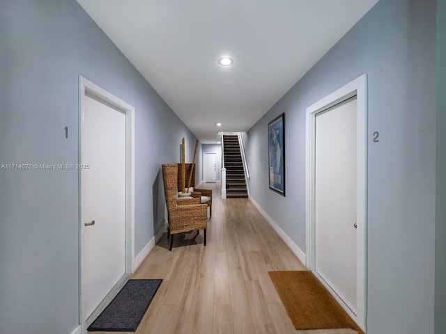 1018 Meridian Ave Unit 4, Miami Beach, FL 33139 - hall with recessed lighting, light wood-type flooring, and stairway