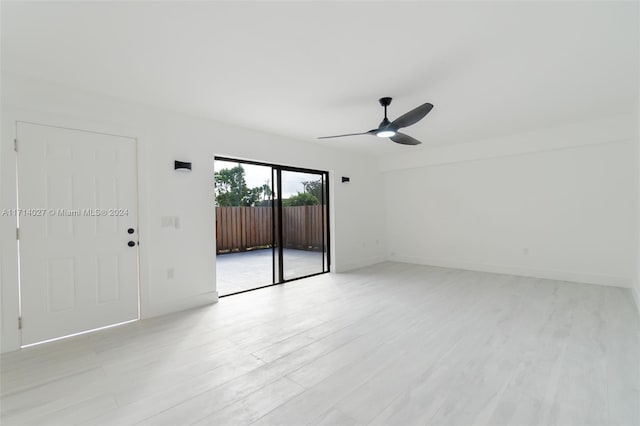 unfurnished room featuring ceiling fan and light hardwood / wood-style floors