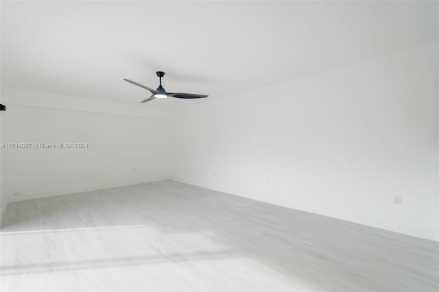 spare room with ceiling fan