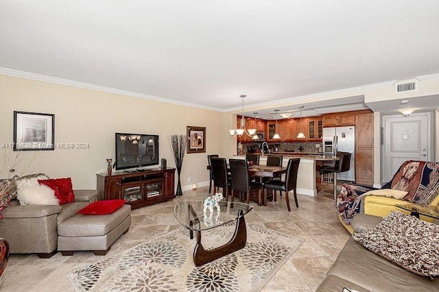 living room featuring crown molding