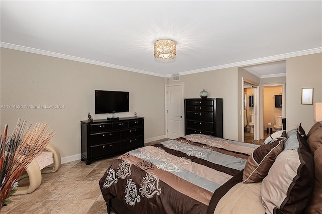 bedroom featuring connected bathroom and crown molding