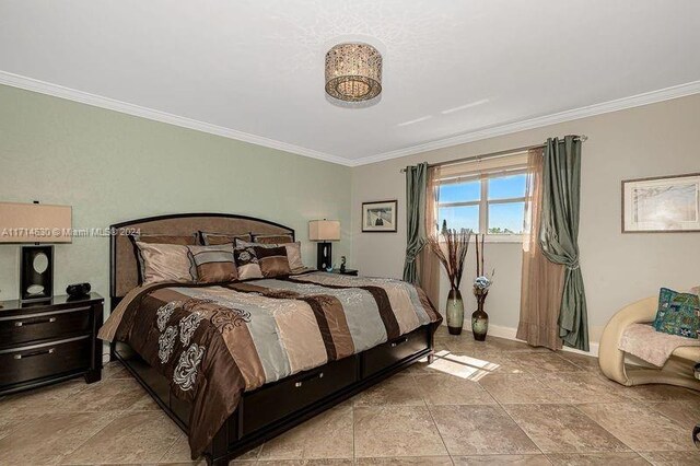 bedroom with crown molding