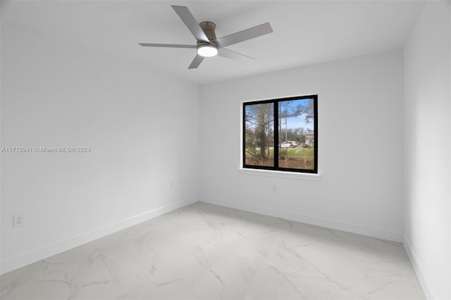 empty room featuring ceiling fan