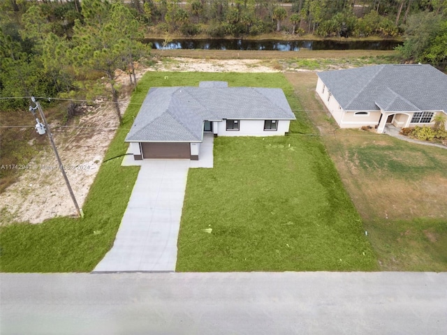 drone / aerial view featuring a water view